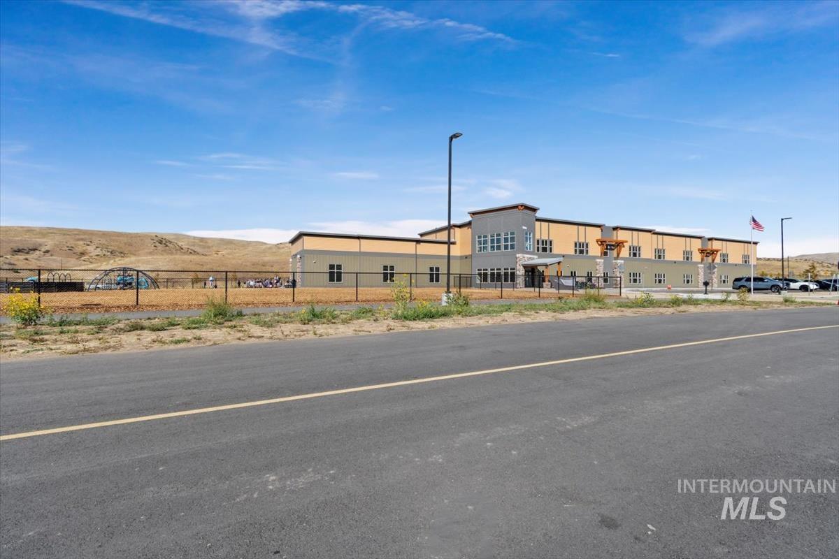 View of building exterior featuring a mountain view