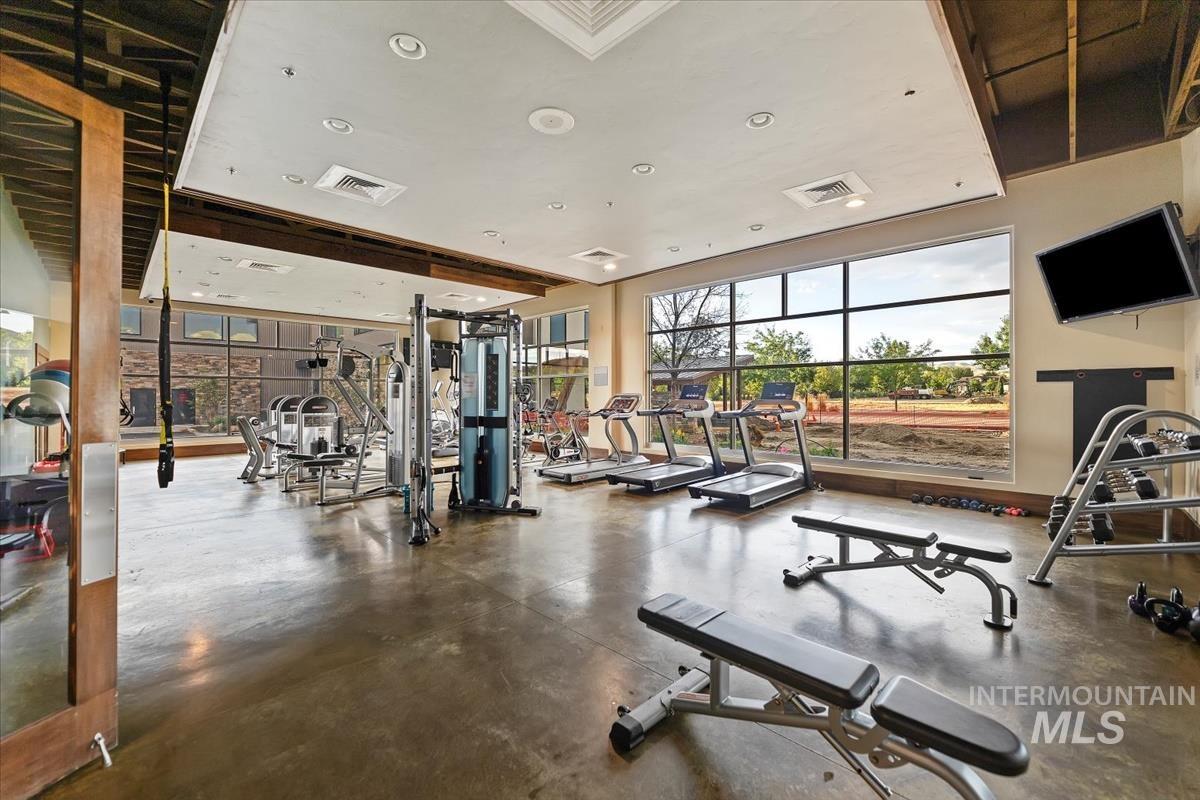 Gym featuring plenty of natural light and recessed lighting