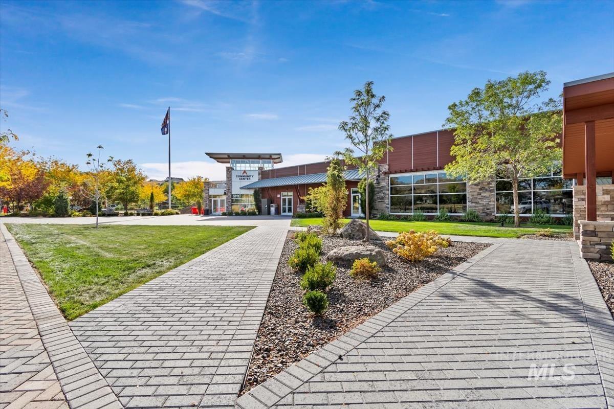 View of home's community featuring a yard