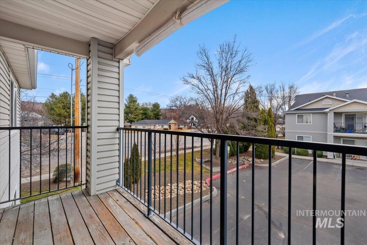 Balcony featuring a residential view