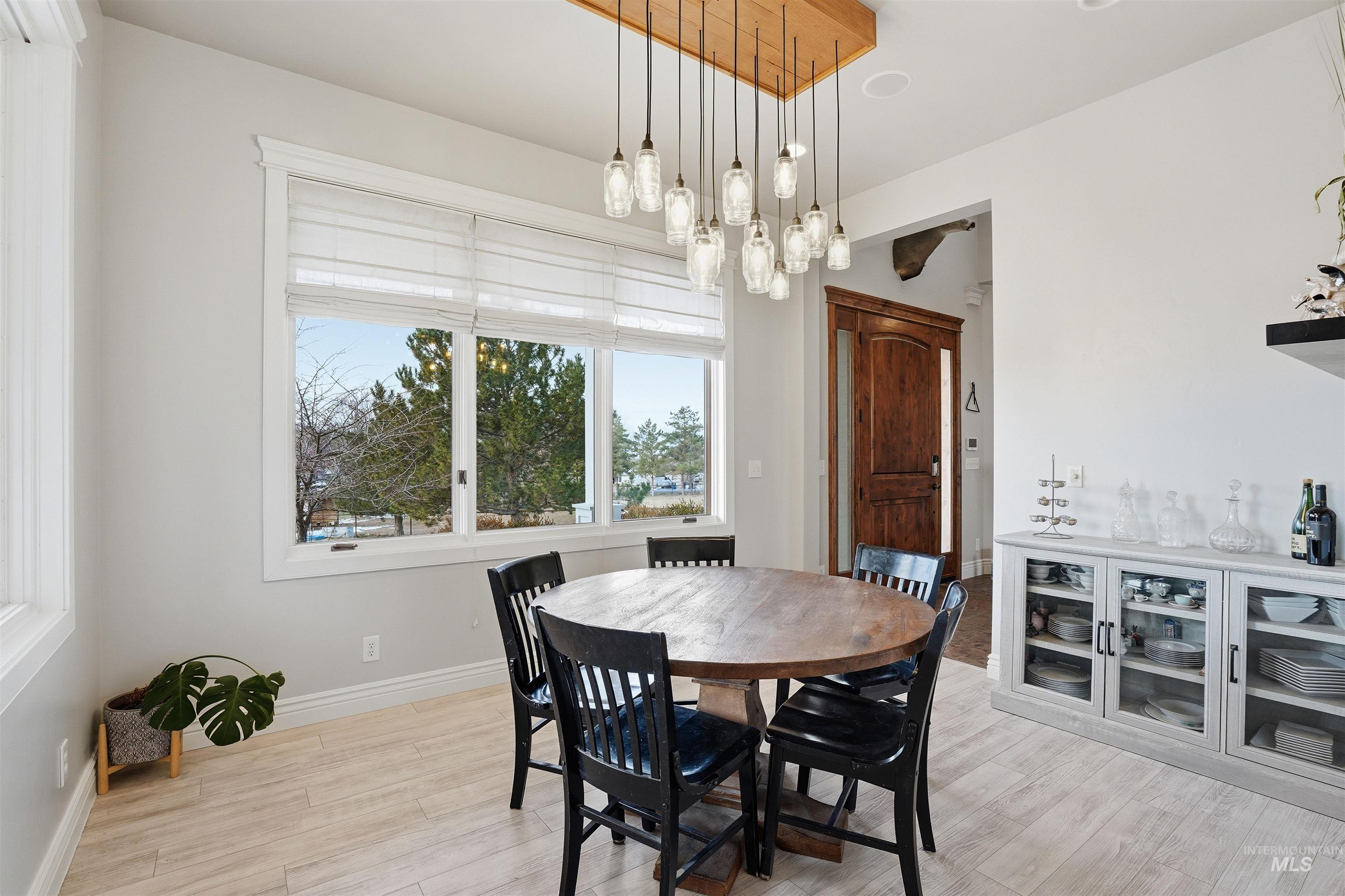 Dining area featuring light wood-type flooring