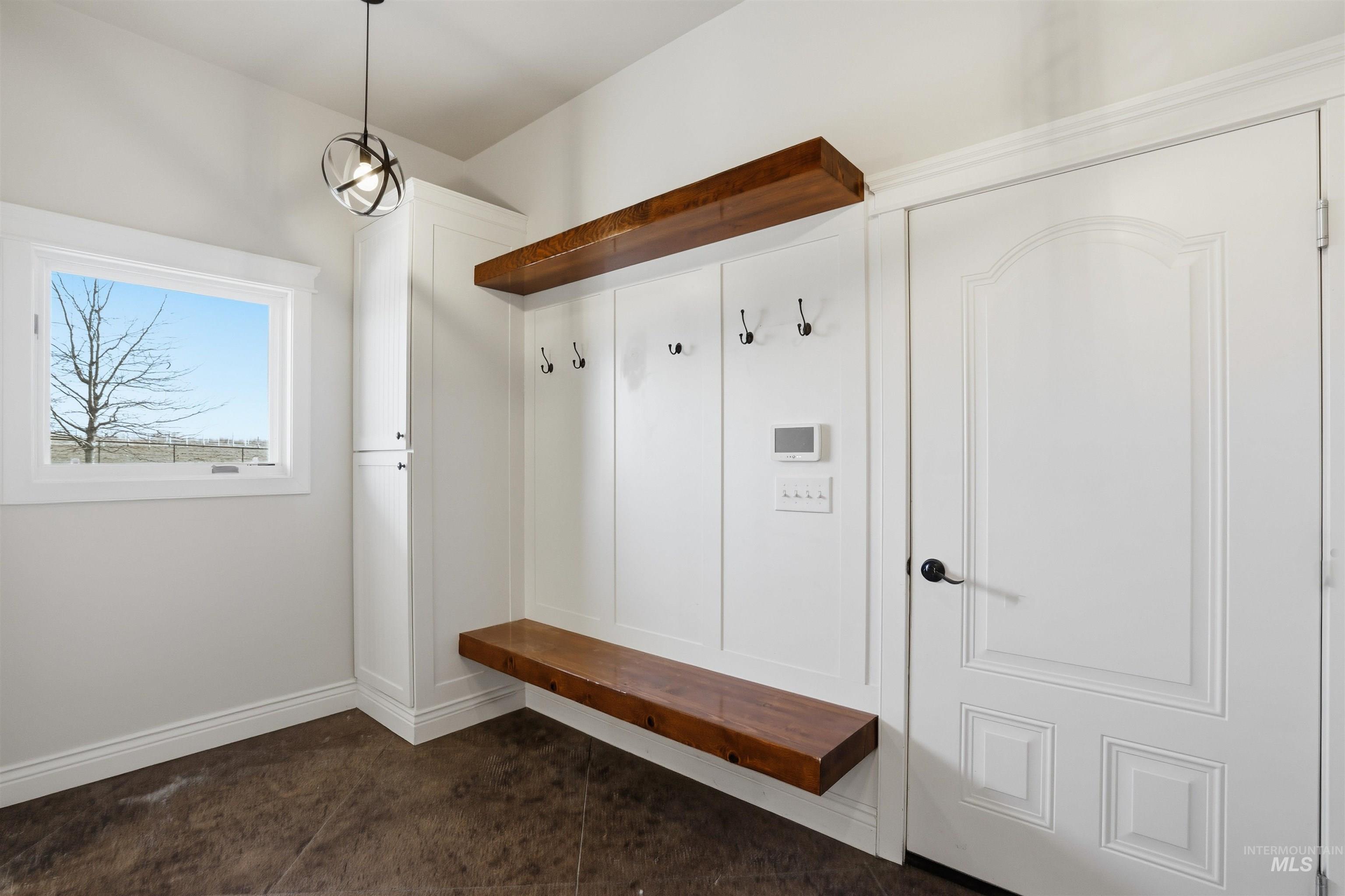 Mudroom featuring baseboards