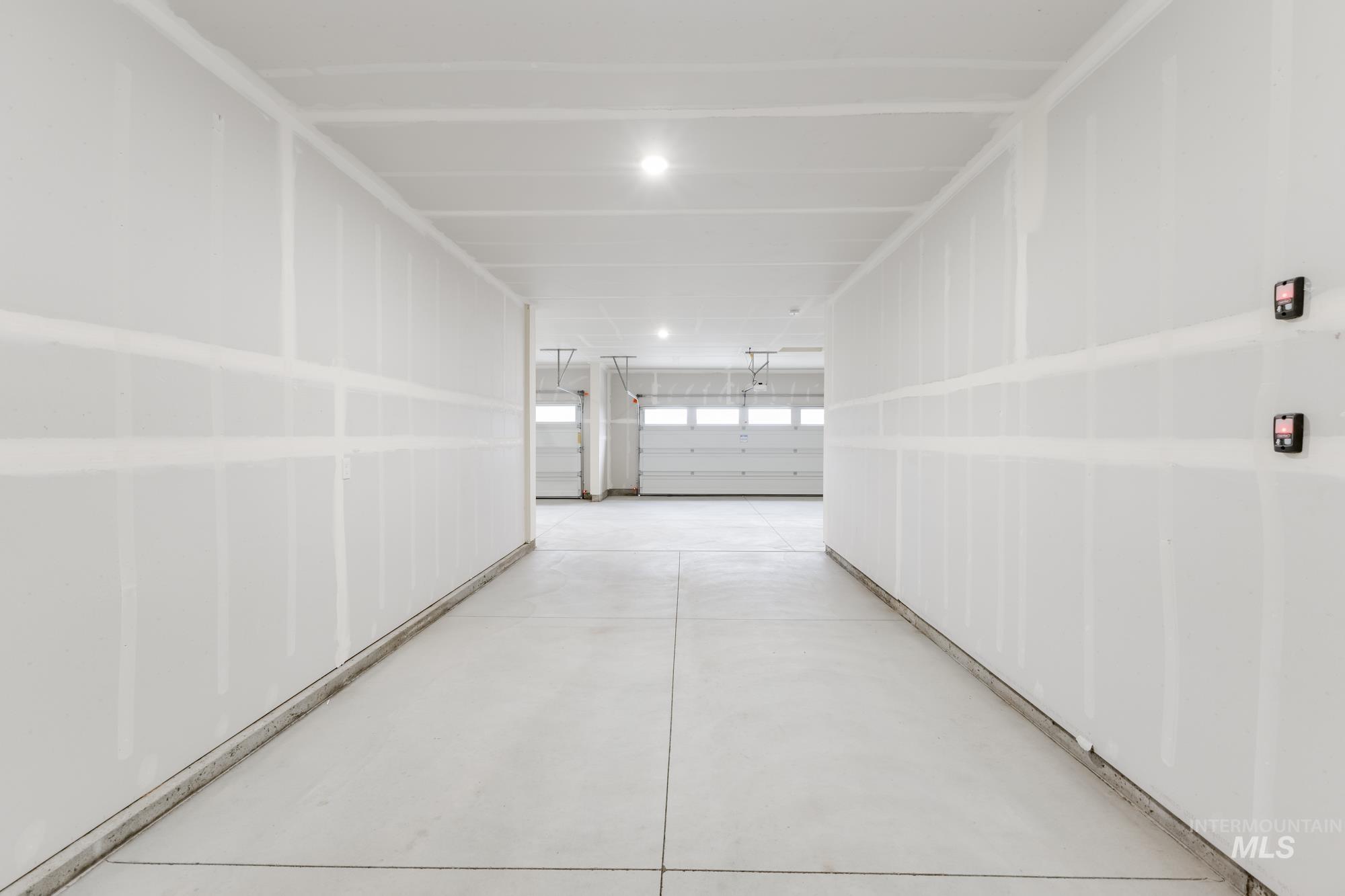 Hallway with concrete flooring