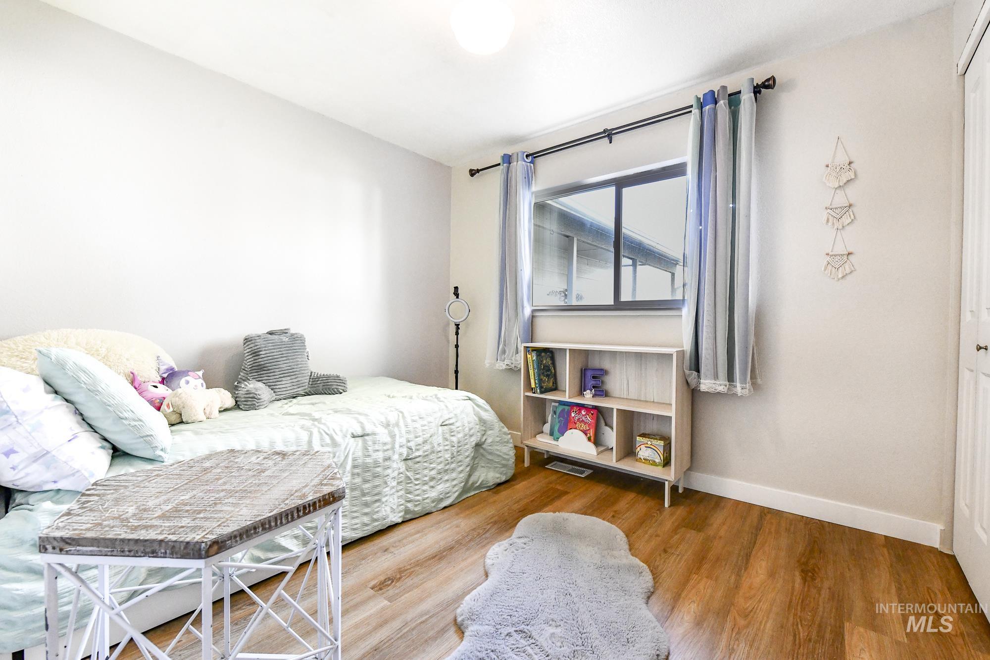 Bedroom featuring wood finished floors