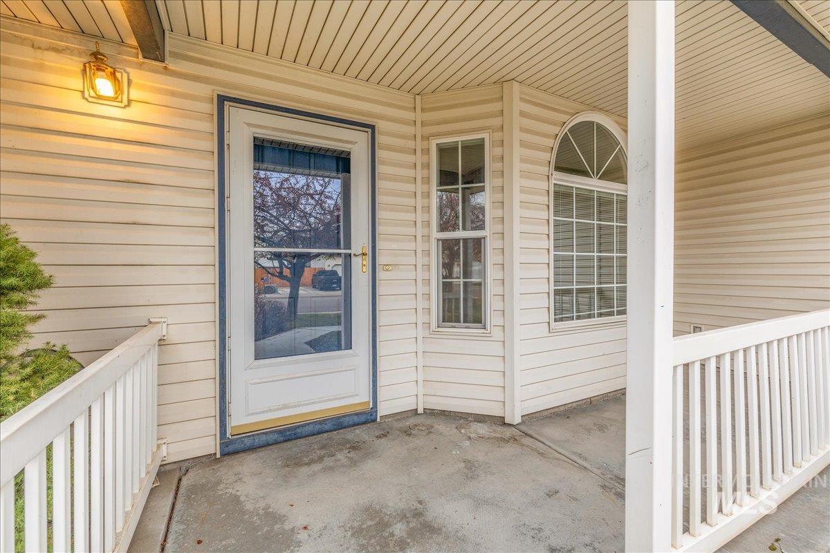 Property entrance featuring a porch