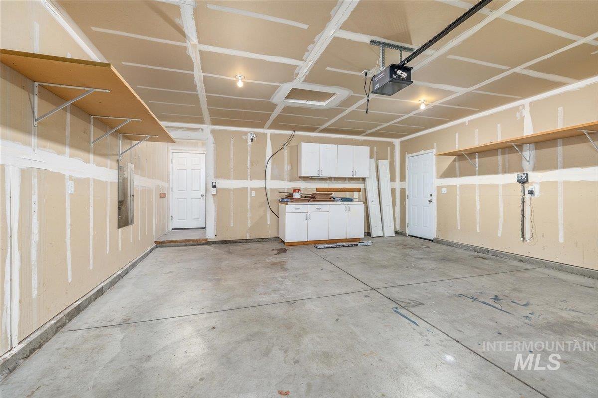 Two car garage with a garage door opener