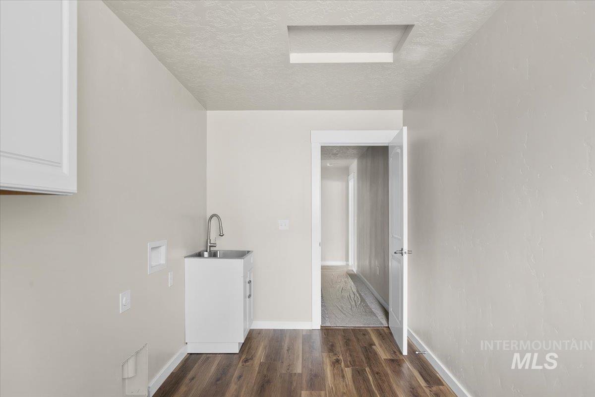 Large laundry room with space for a craft station