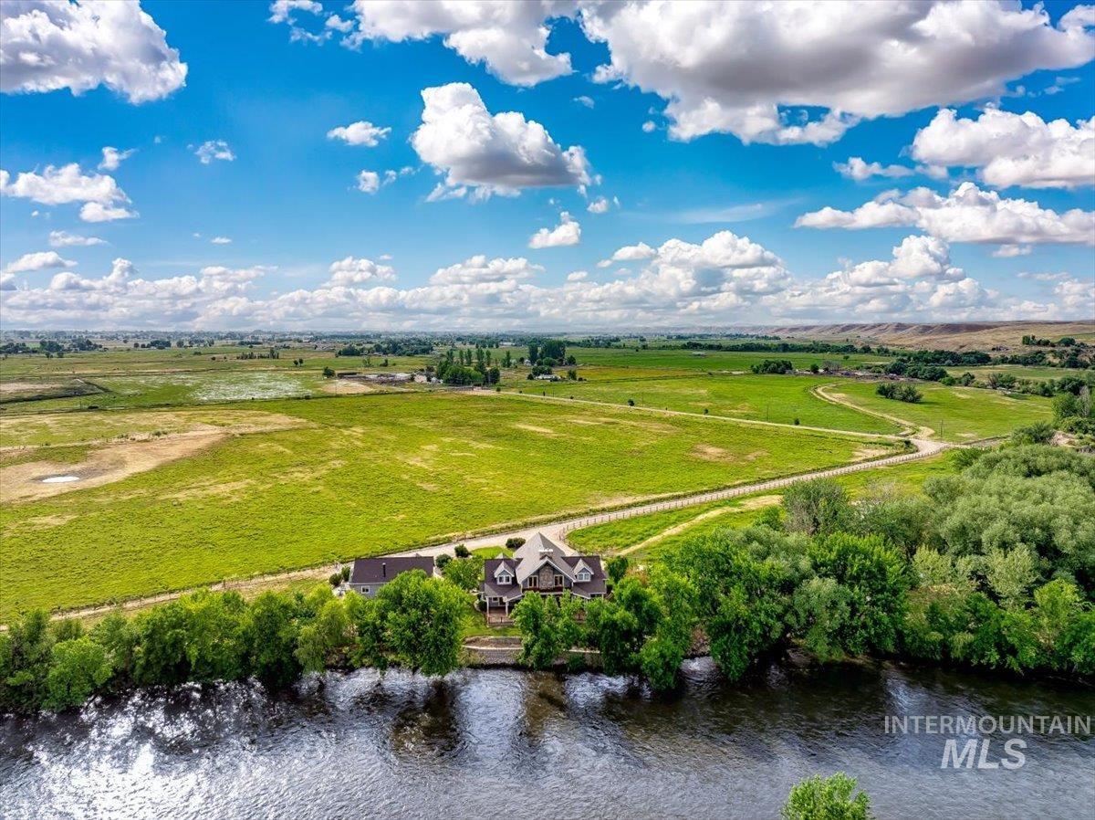 View of rural area featuring a nearby body of water