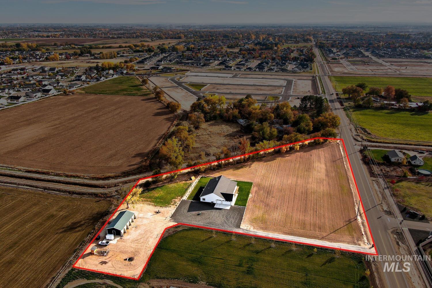 Aerial view of property's location with property parcel outlined