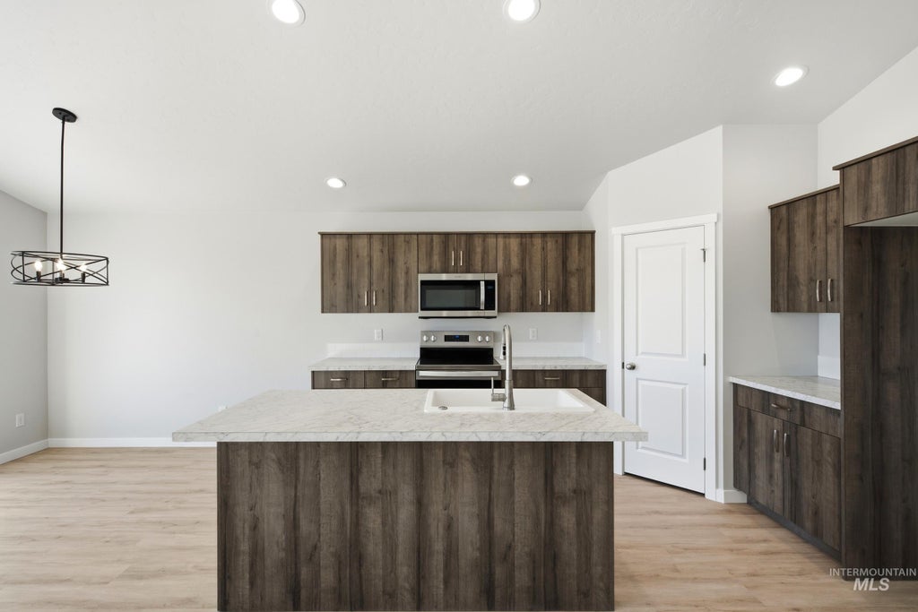 Photo of 4486 S Amsterdam Ave, Nampa, ID 83686 (MLS # 99000934)