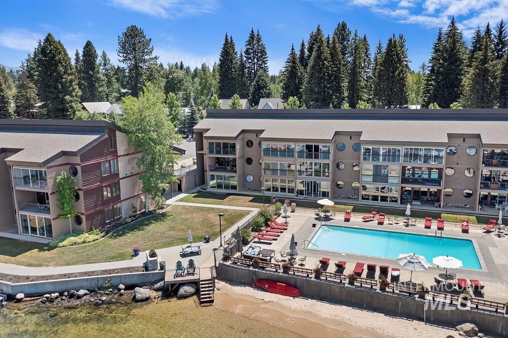 View of property with a pool