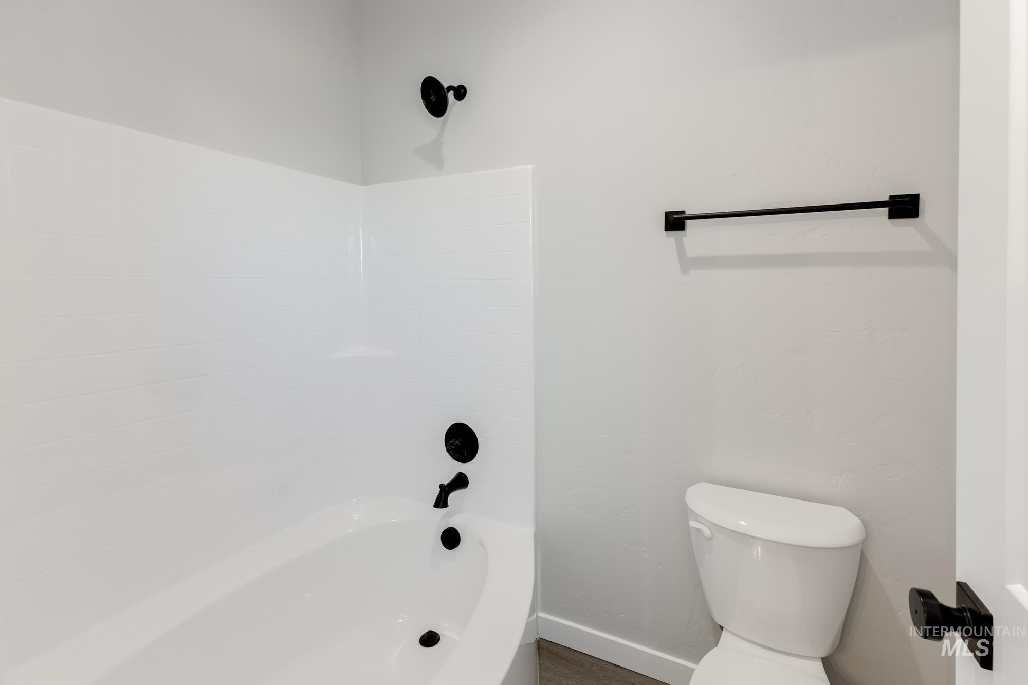 Full bath with toilet and bathing tub / shower combination