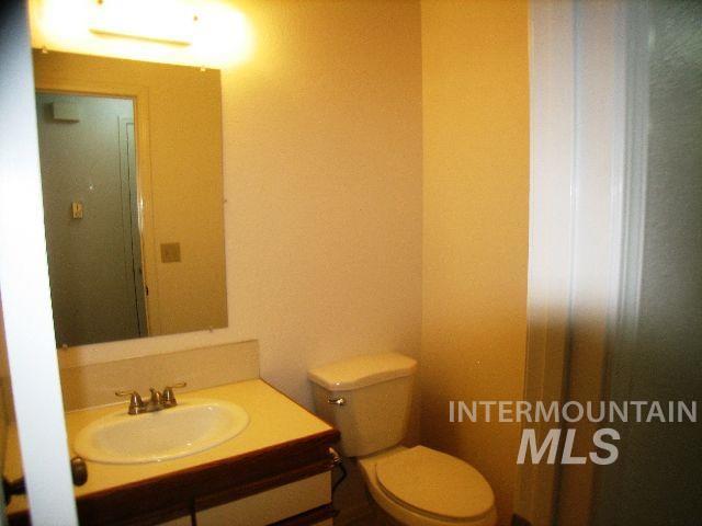 Bathroom with toilet and vanity