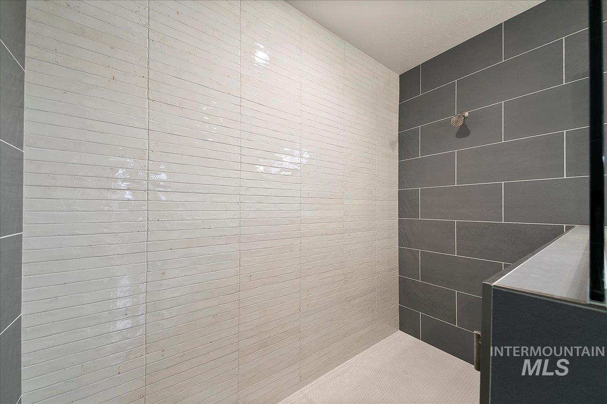 Bathroom with a tile shower