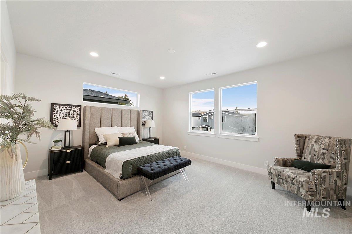 Bedroom featuring carpet and recessed lighting