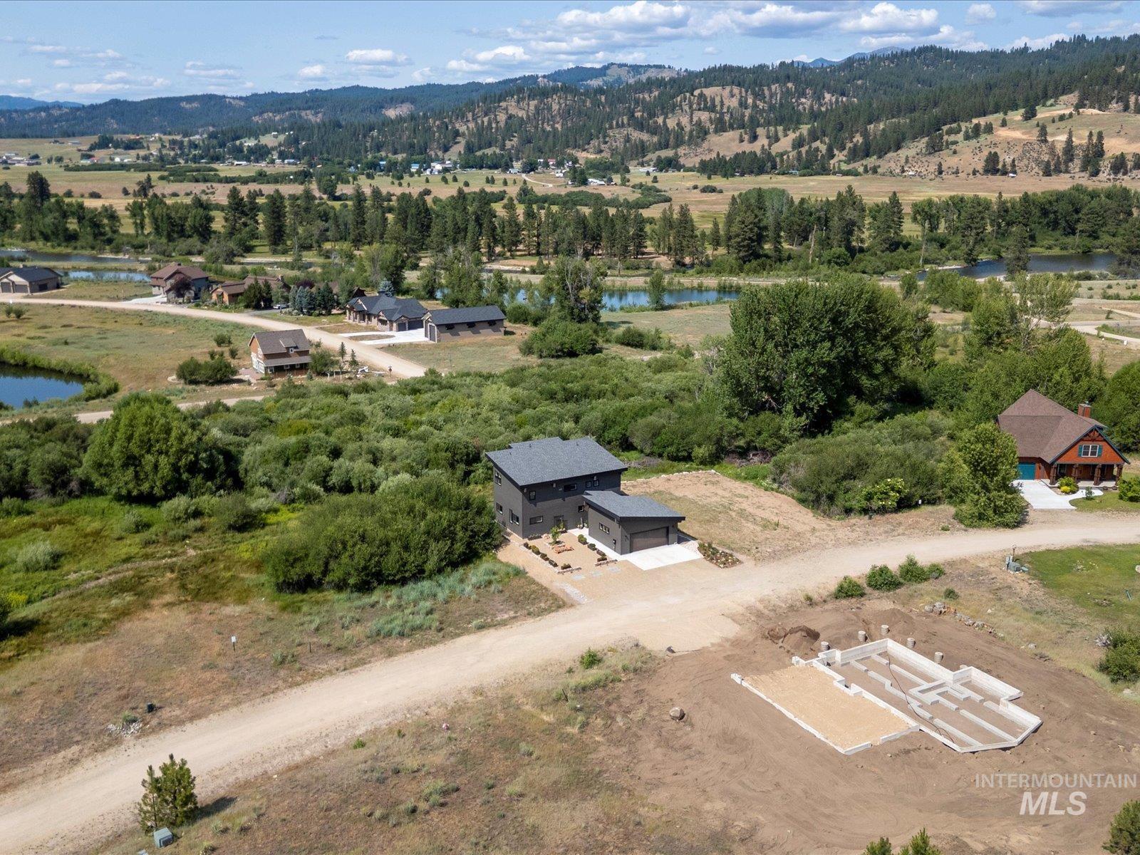 Drone / aerial view of a water and mountain view