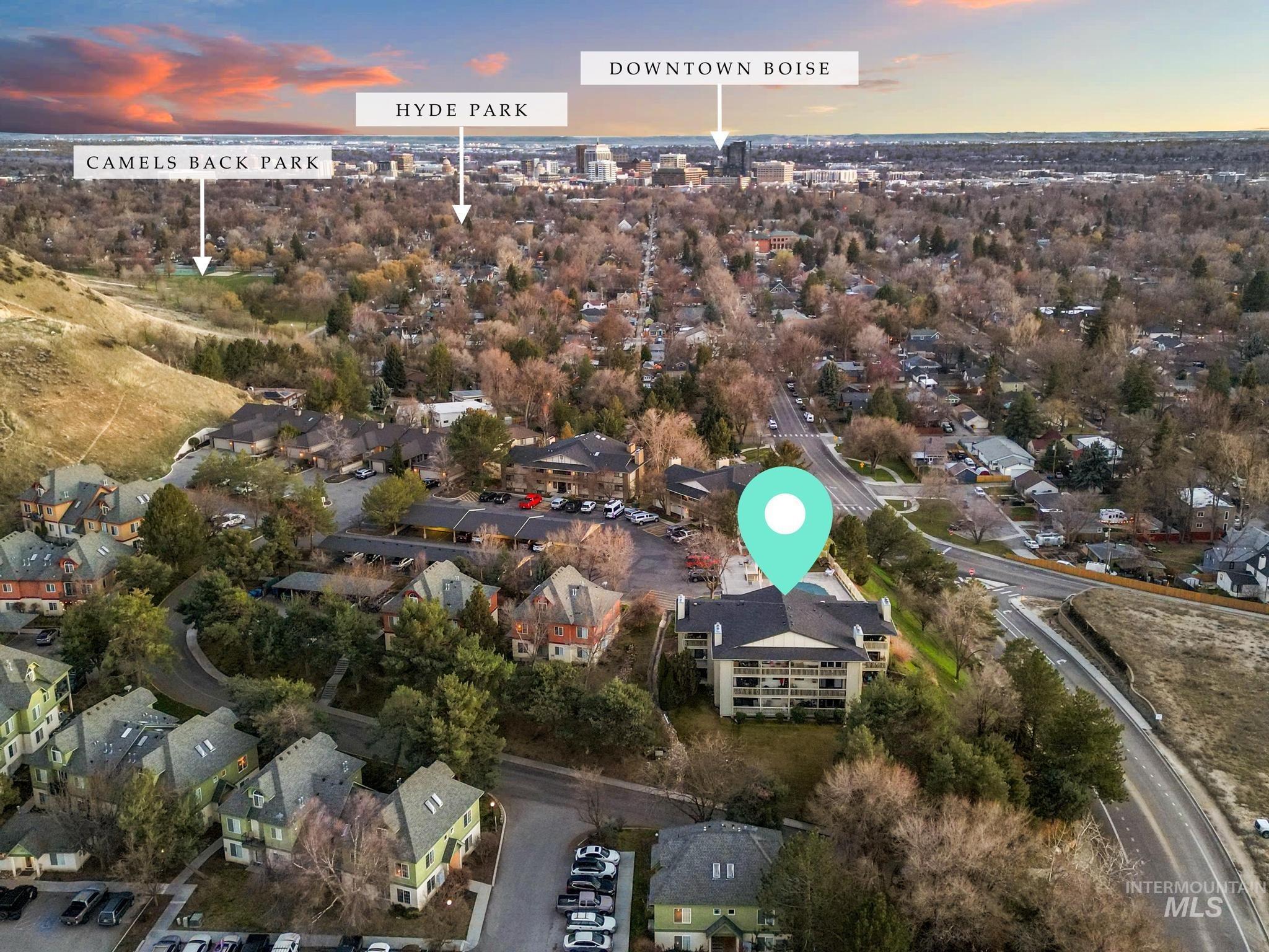 Aerial overview of property's location featuring nearby suburban area