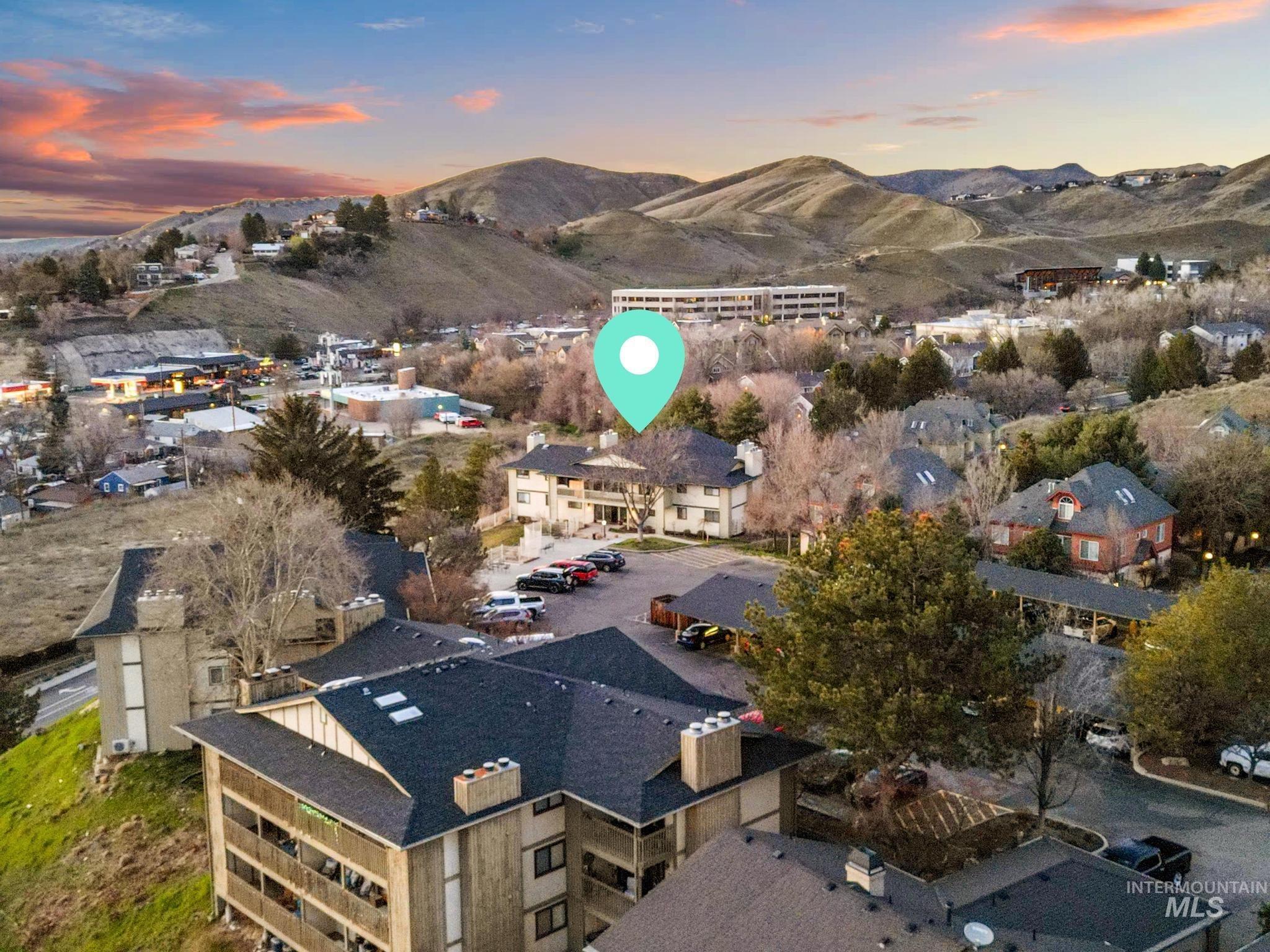 Aerial perspective of suburban area with mountains
