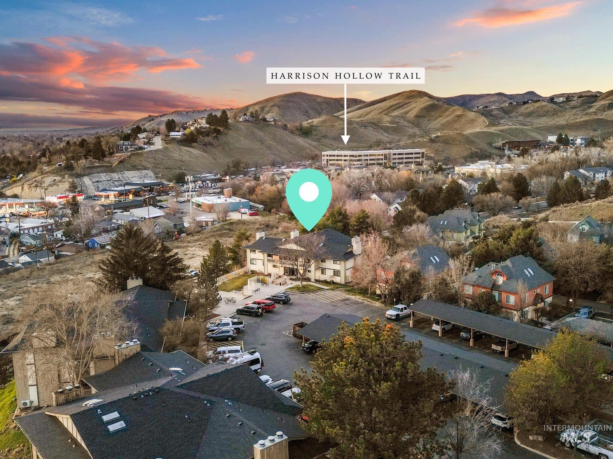 Aerial view at dusk of a residential view and a mountain view
