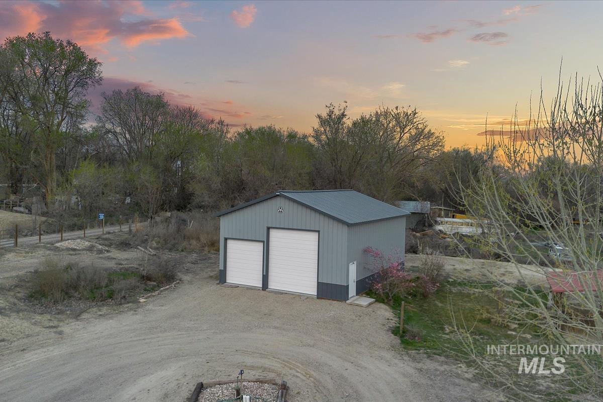 Garage at dusk with a garage
