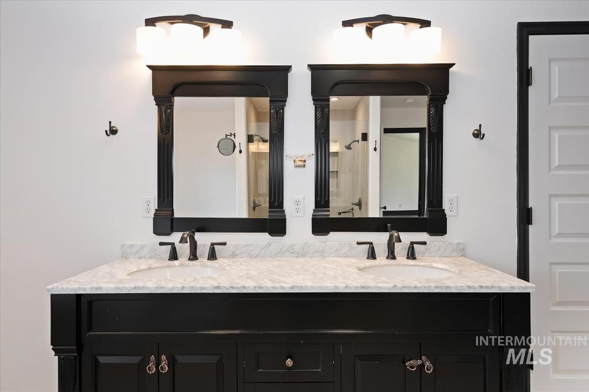 Full bathroom featuring double vanity