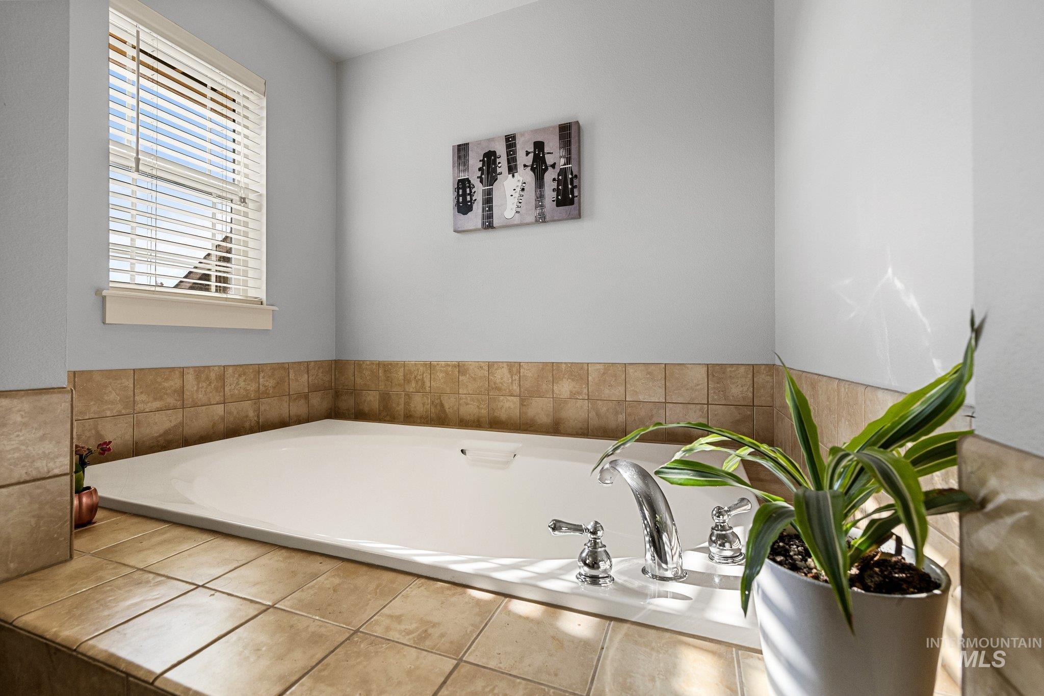 Bathroom featuring a garden tub