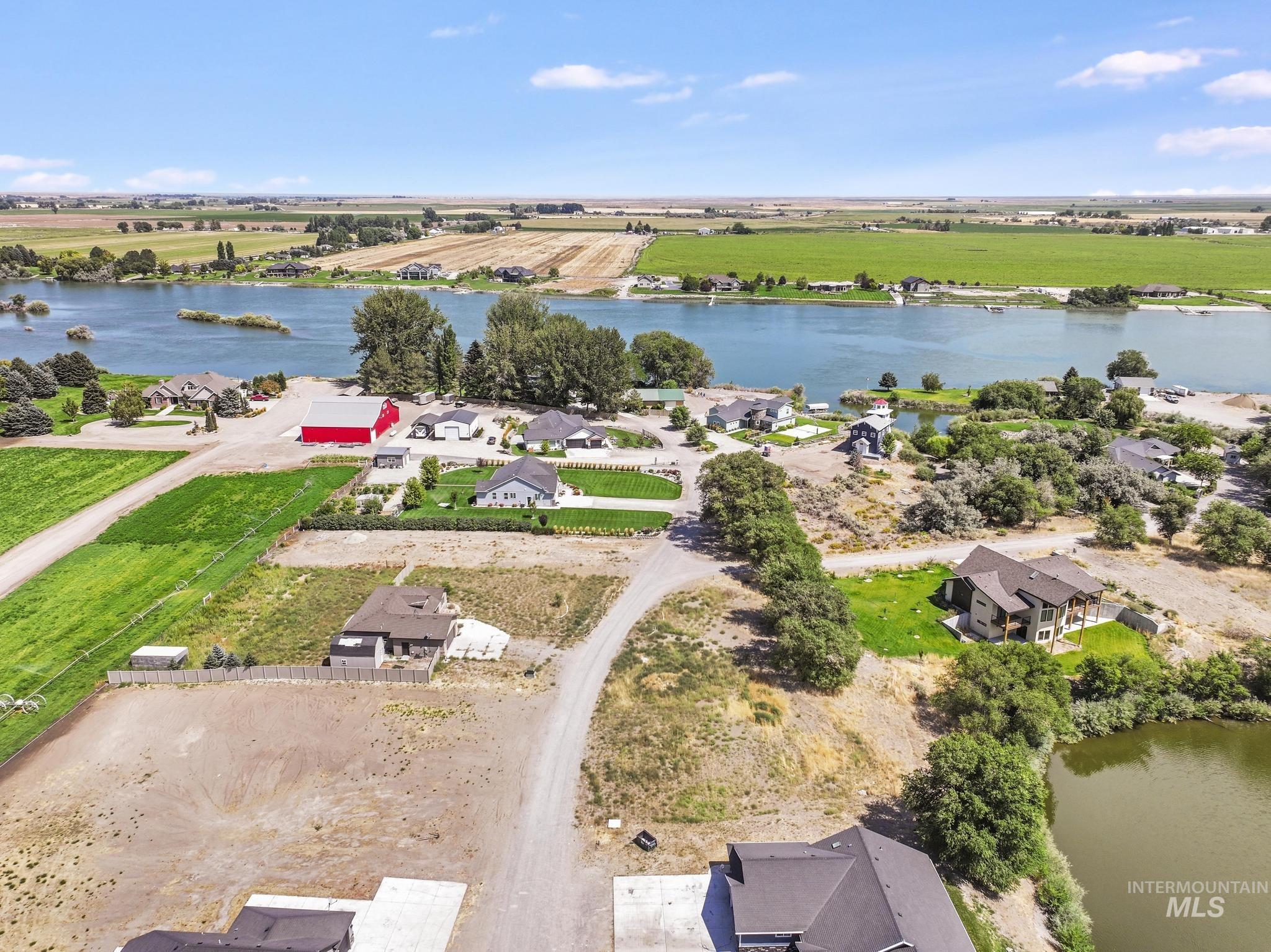 View of rural area featuring a nearby body of water