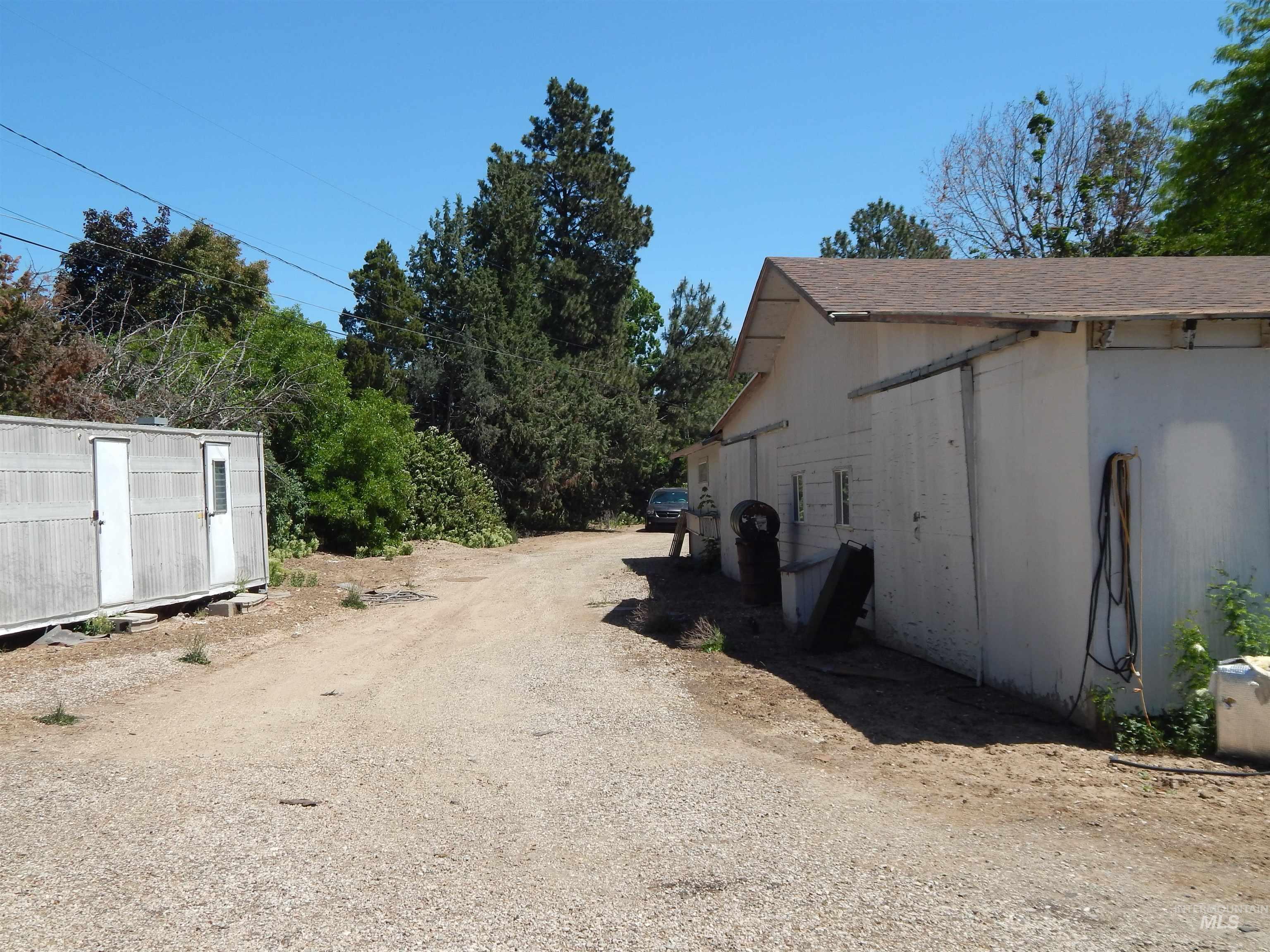 View of dirt / gravel driveway