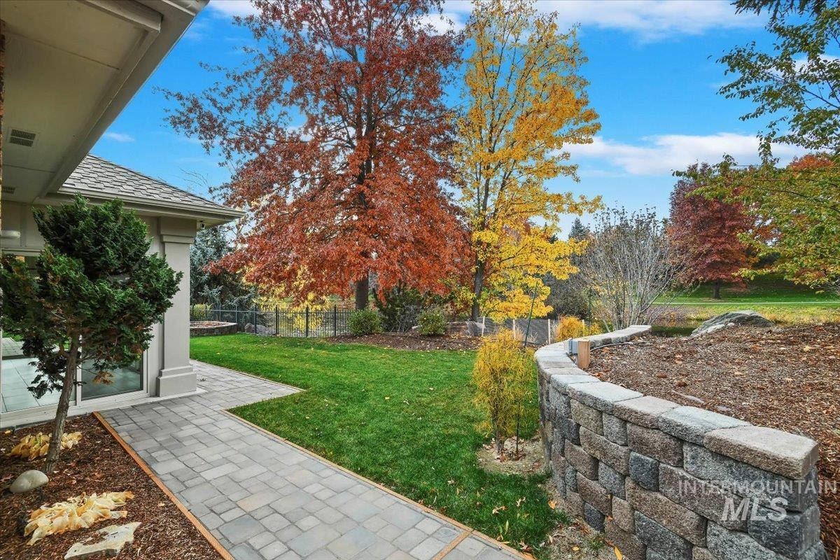 Fenced backyard with a patio area