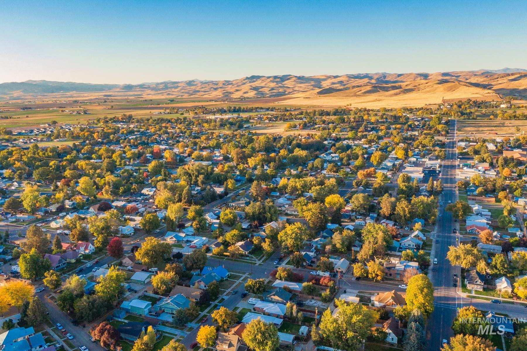 Aerial view of residential area with a mountainous background