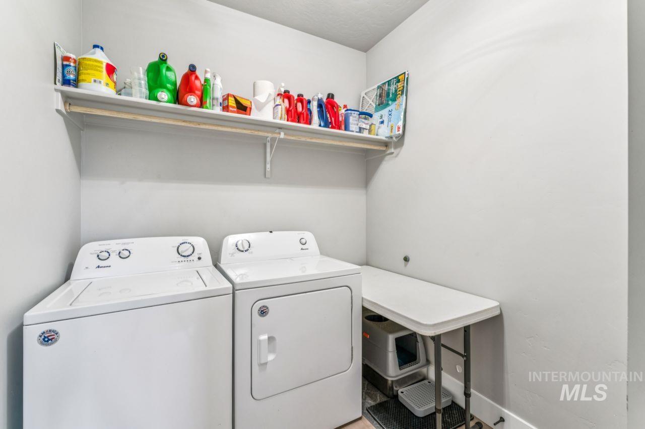 Washroom featuring separate washer and dryer