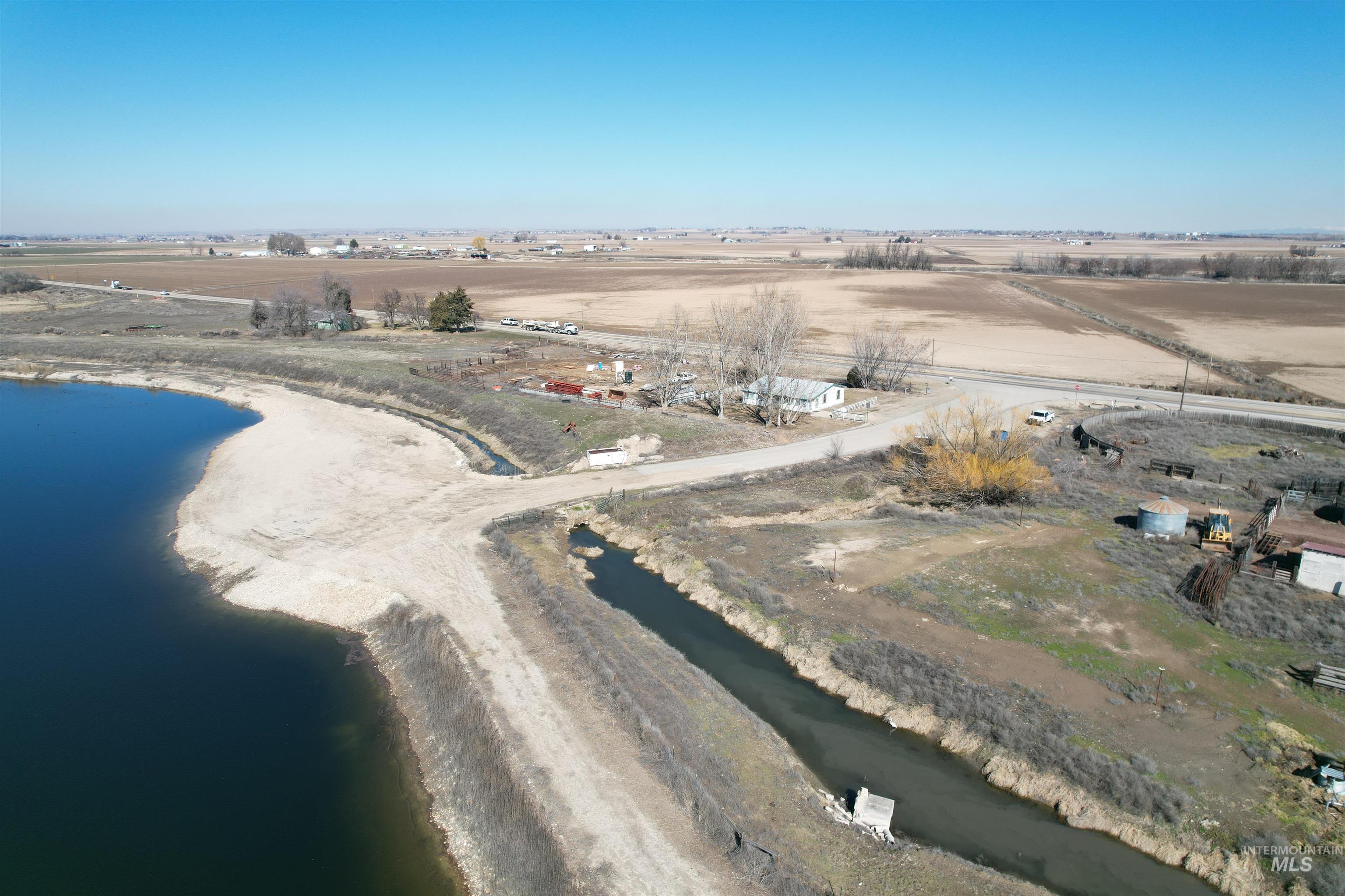 Overview of rural landscape featuring a large body of water