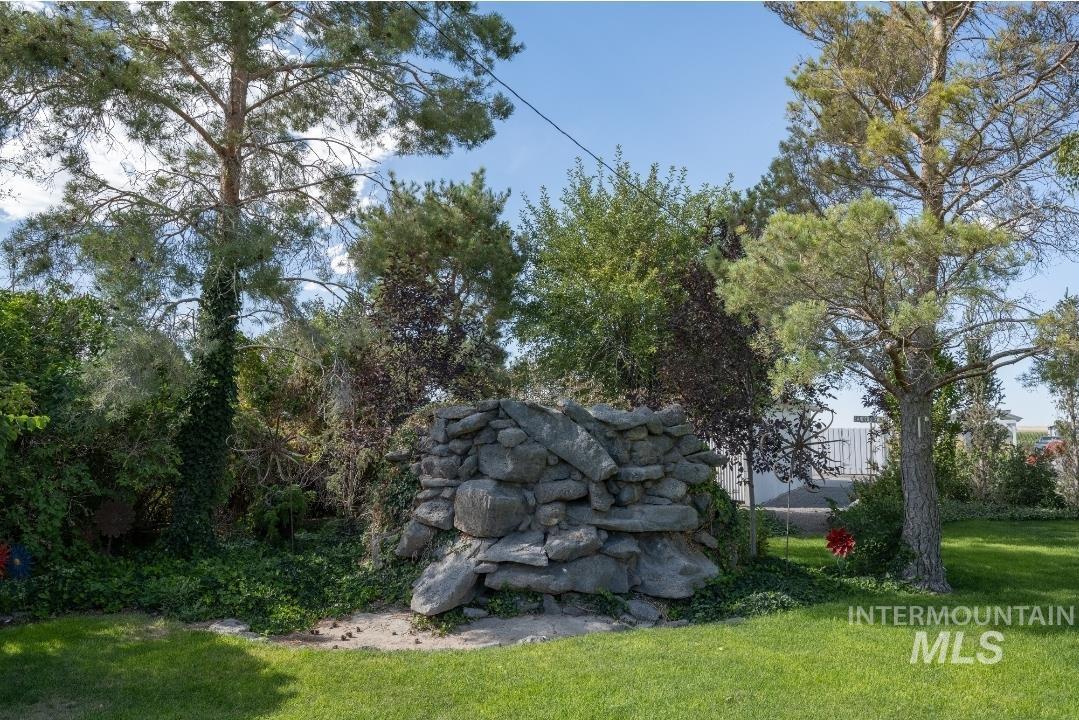 Community sign featuring a lawn