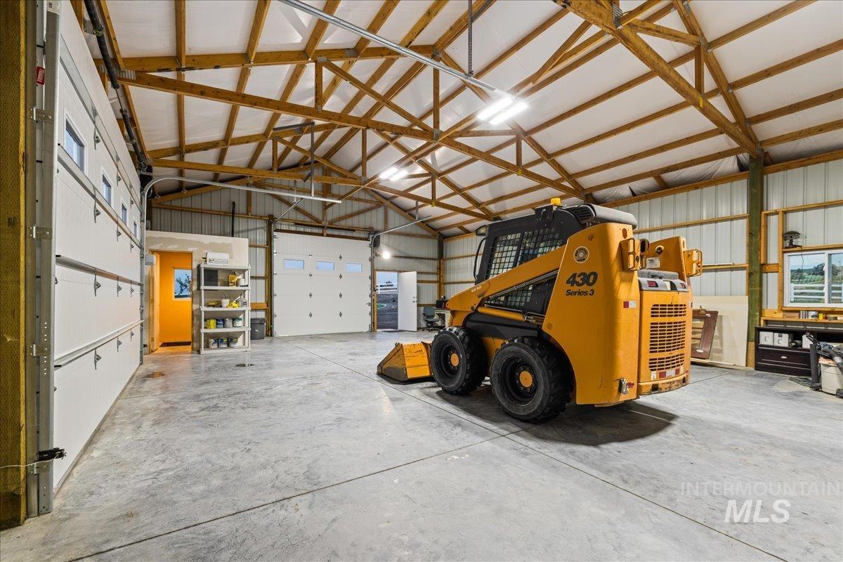 Garage featuring metal wall