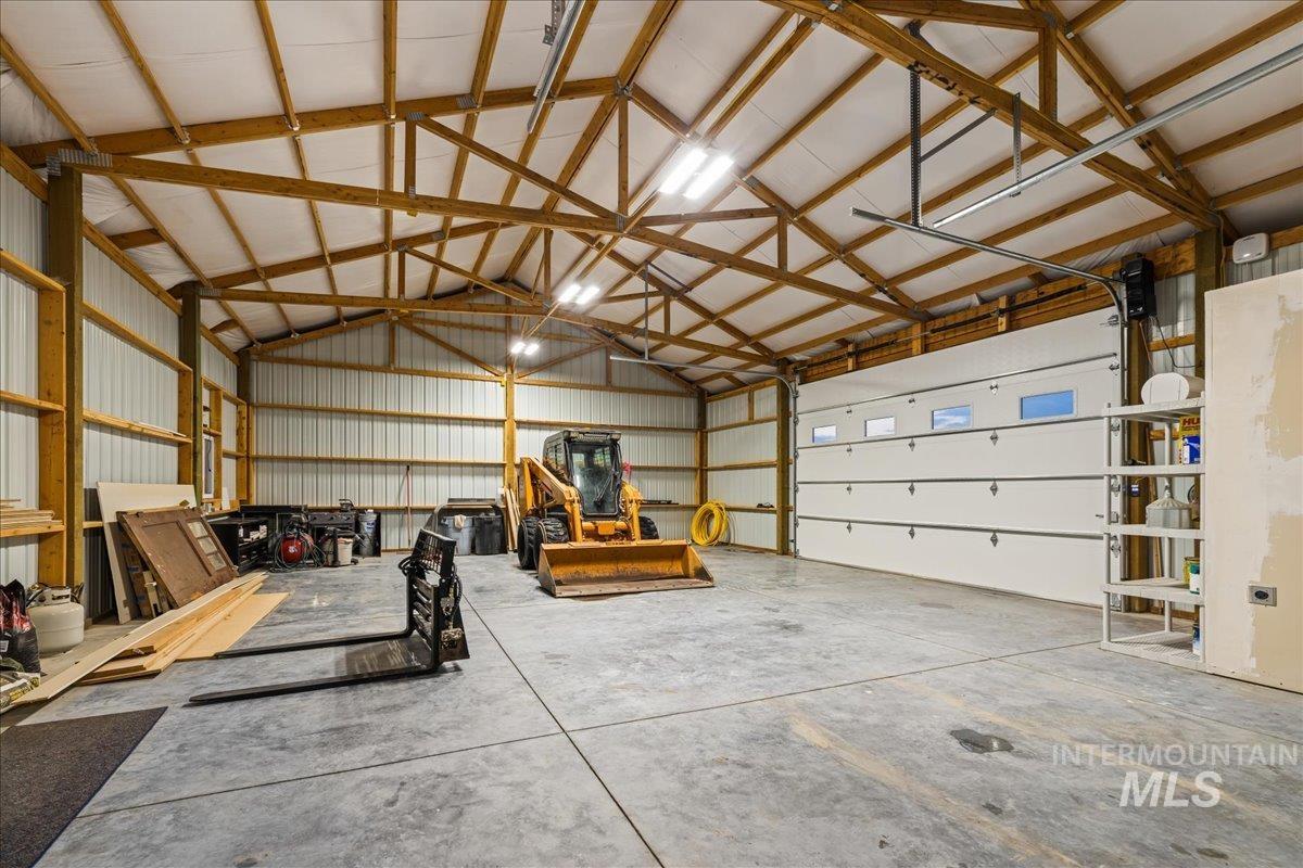 Garage featuring metal wall