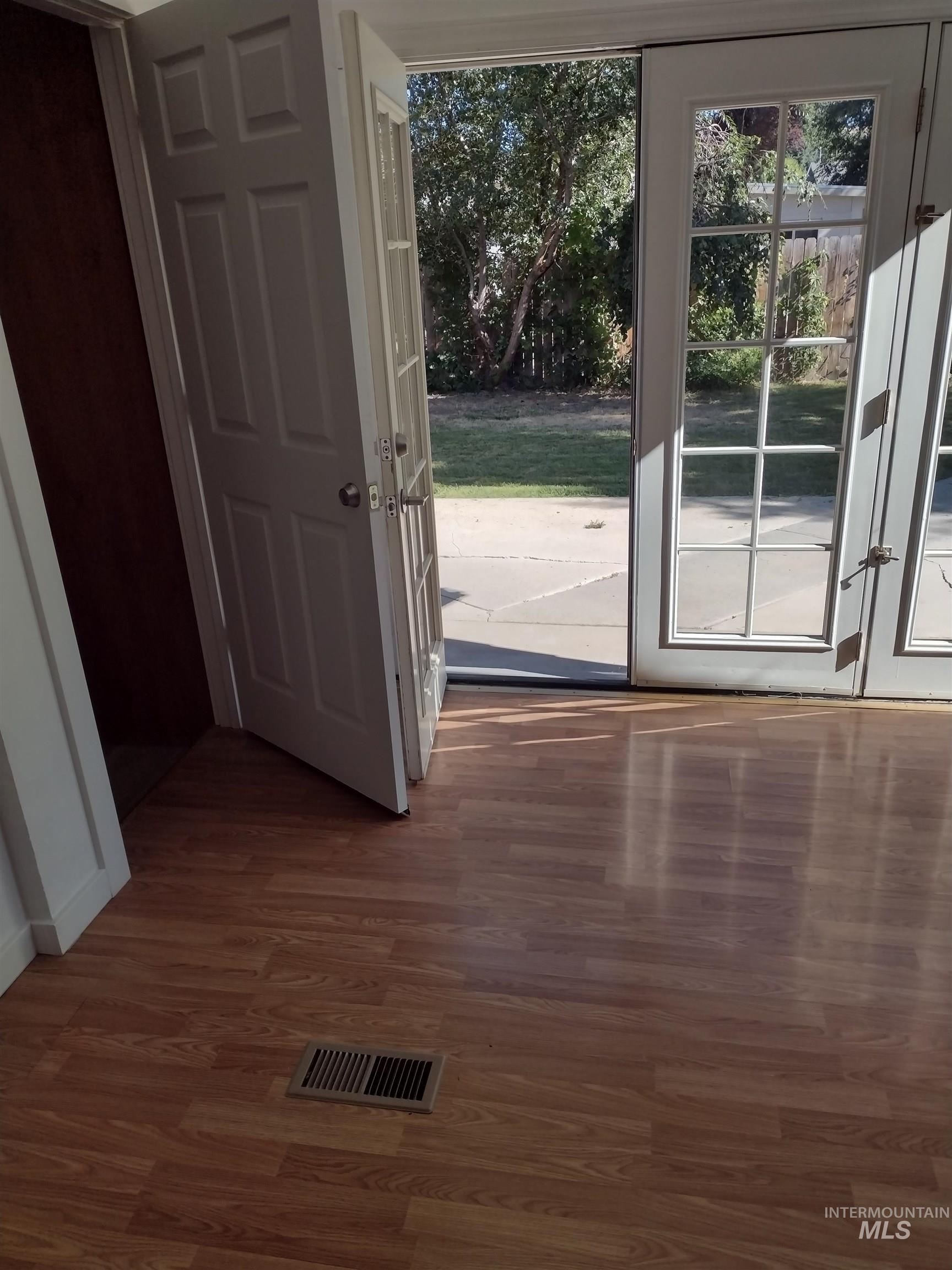 Entryway featuring wood finished floors