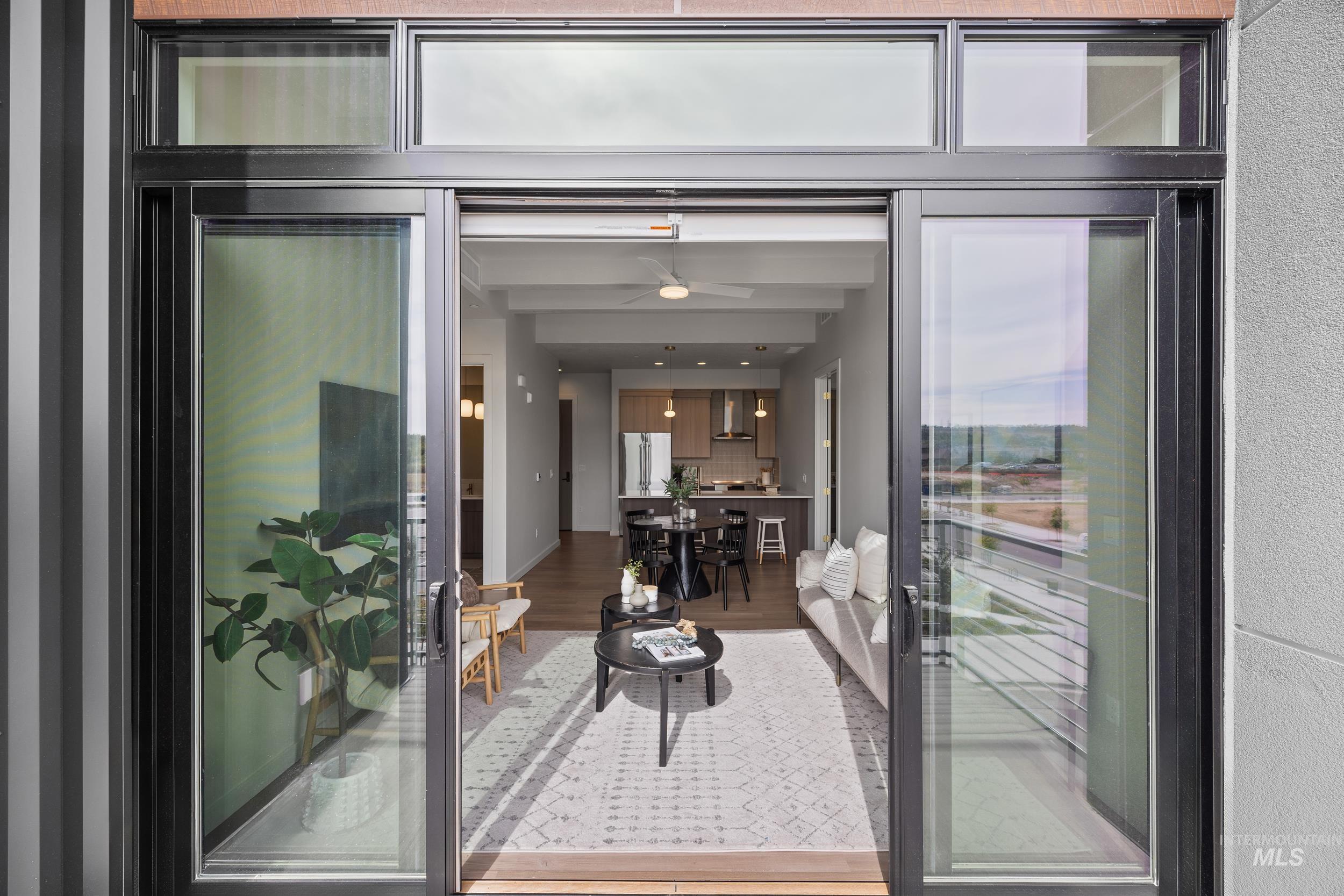 Interior space with wood finished floors and ceiling fan