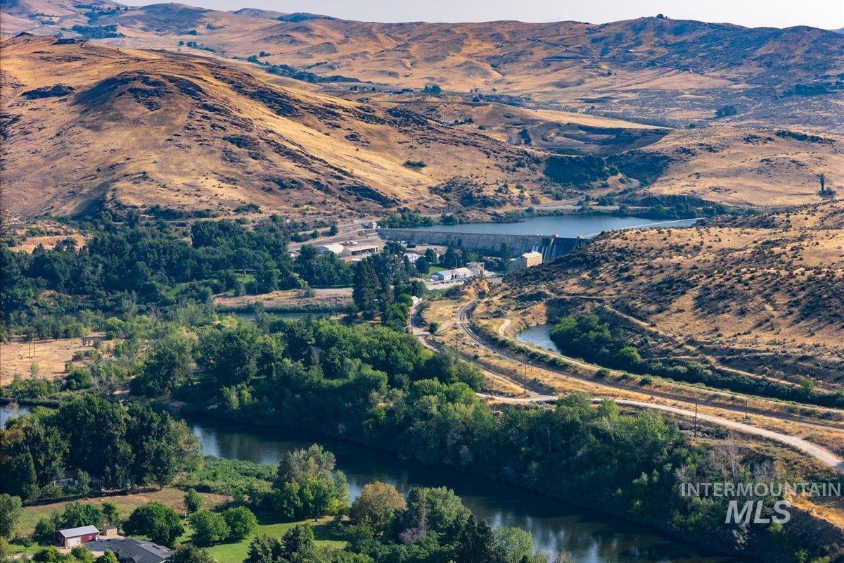 Aerial overview of property's location with a water and mountain view