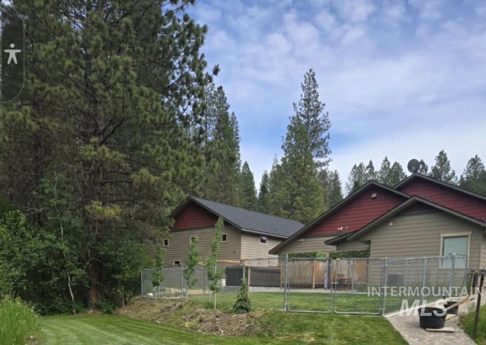 Exterior space featuring a gate