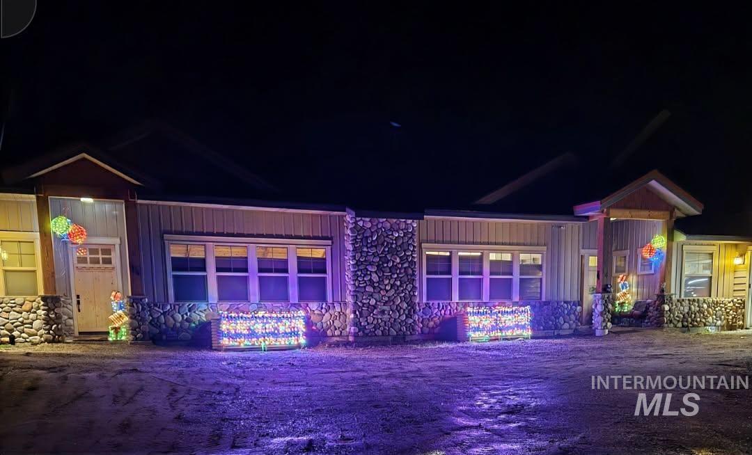View of property at twilight