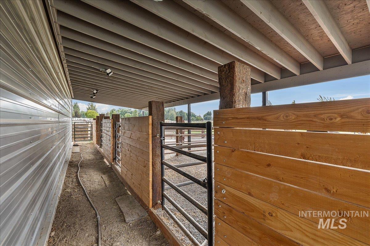 View of property exterior featuring an outbuilding and an exterior structure