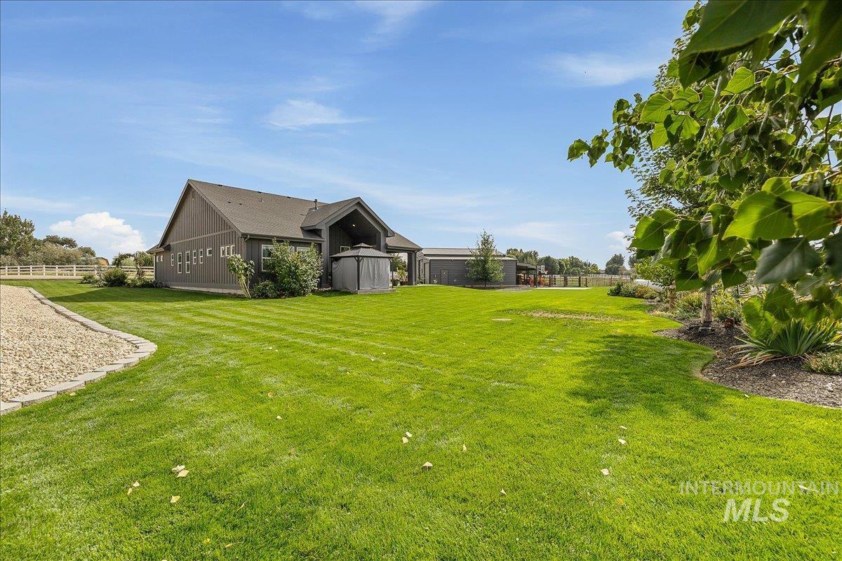 View of yard with an outbuilding