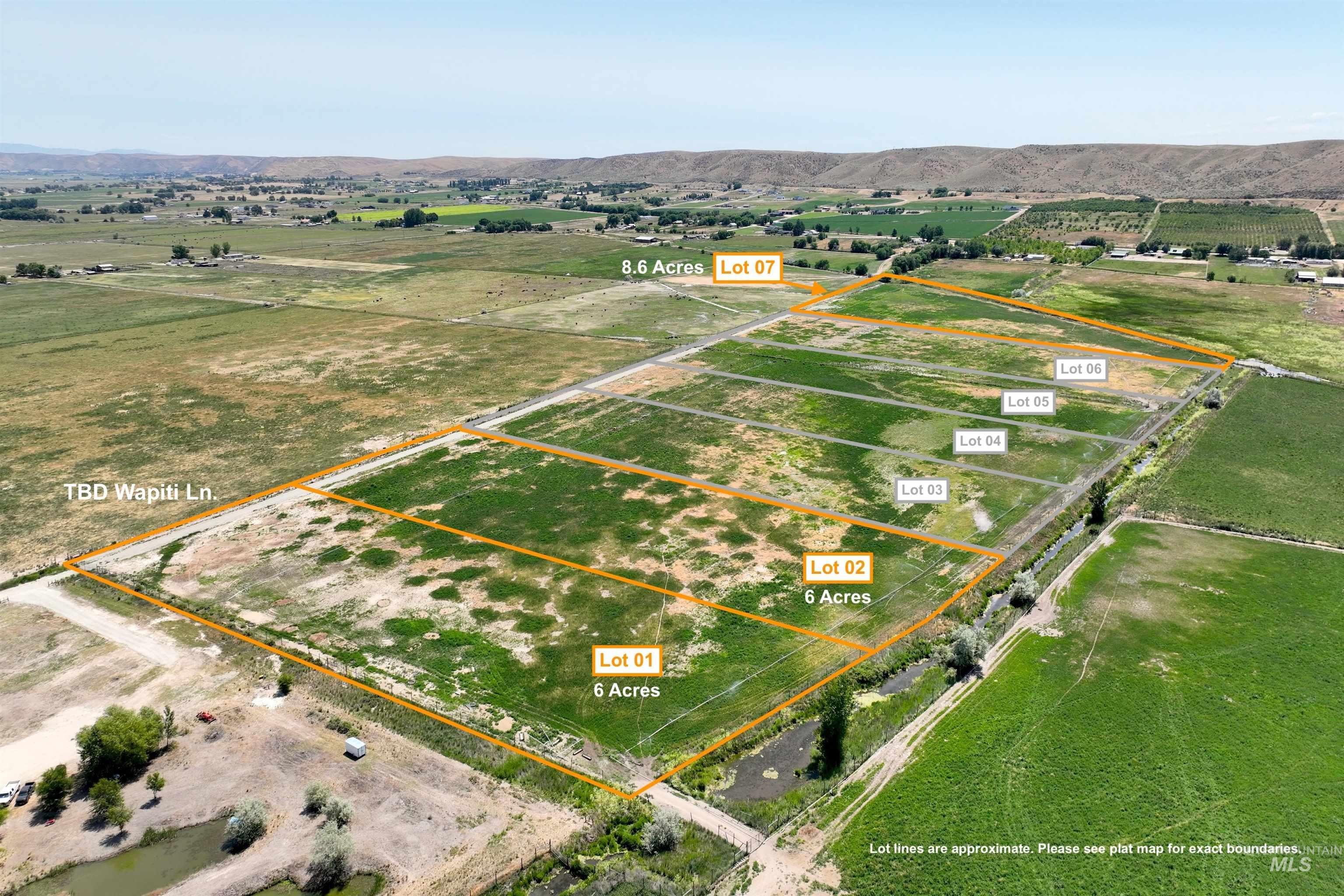 Aerial view of sparsely populated area with property boundaries highlighted