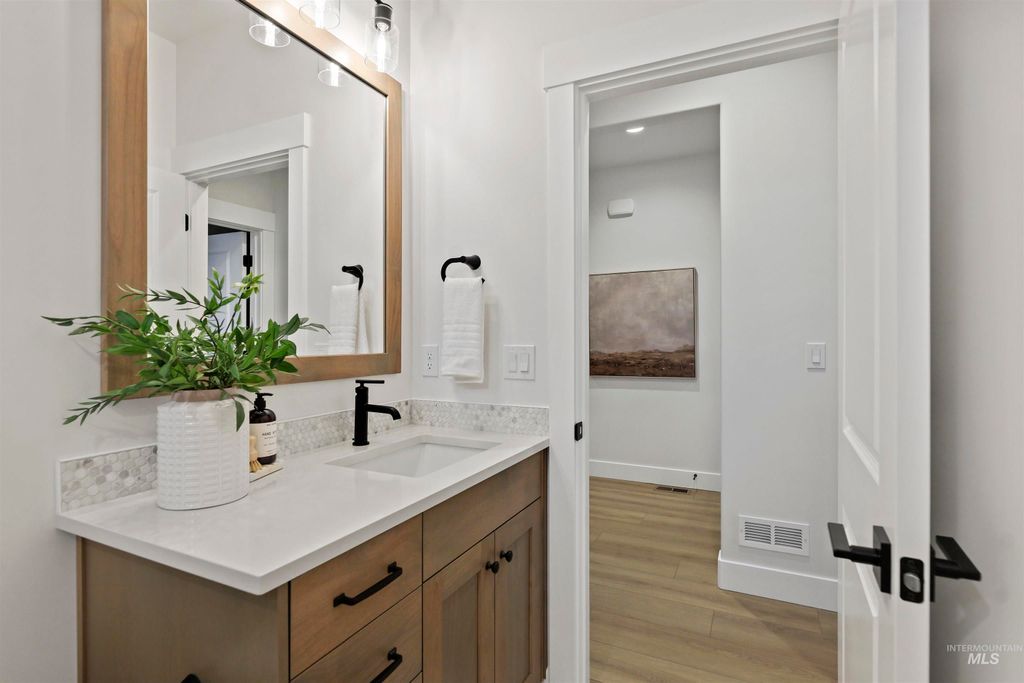 Photo of 869 S Contusion Ave, Nampa, ID 83651 (MLS # 98980413)