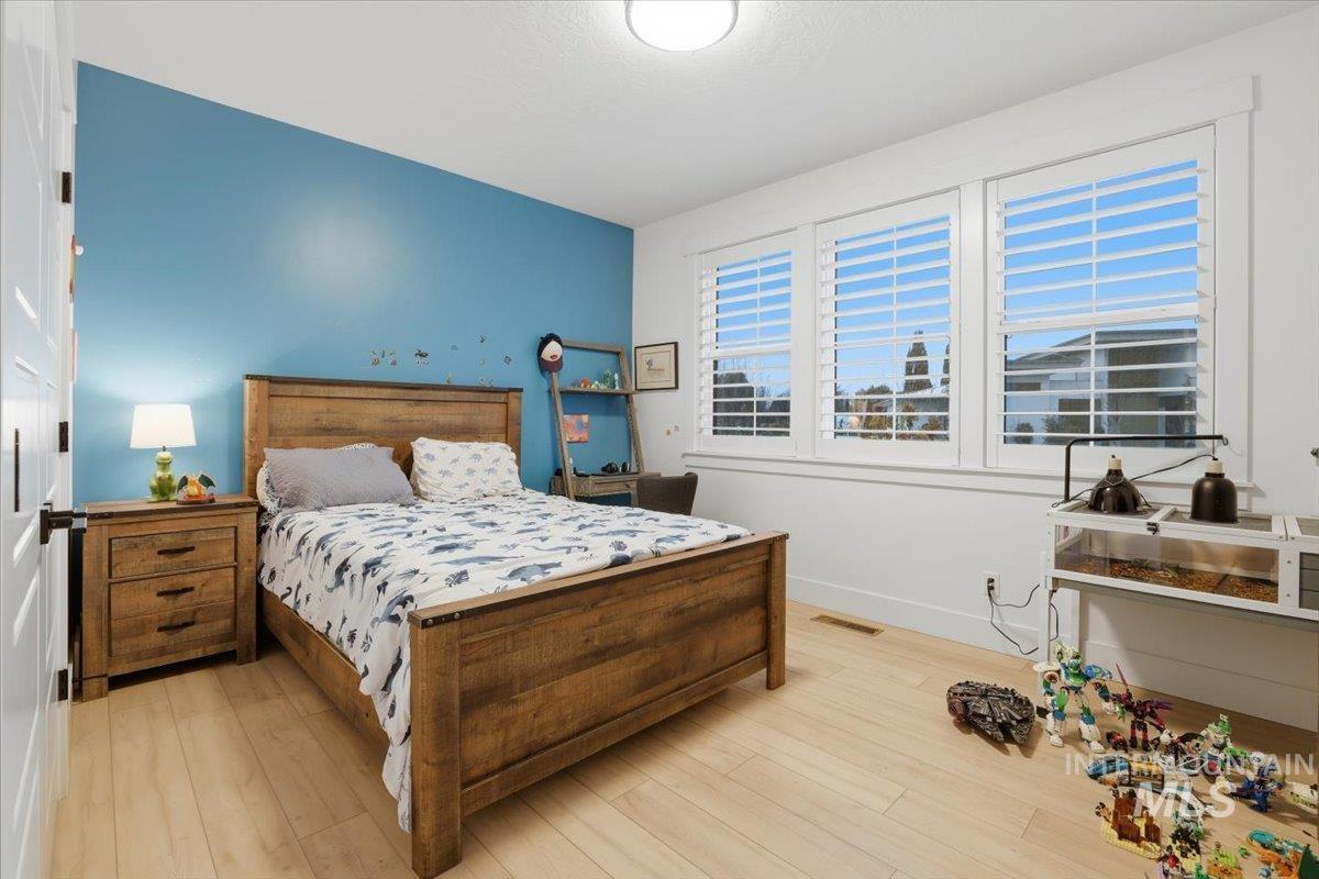 Bedroom featuring light wood-type flooring