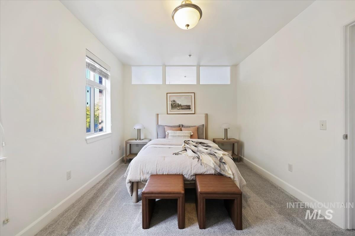 Bedroom with carpet flooring