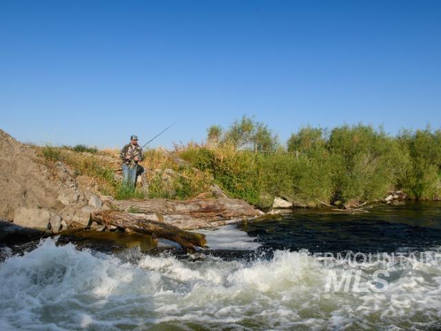 View of undeveloped land with a large body of water
