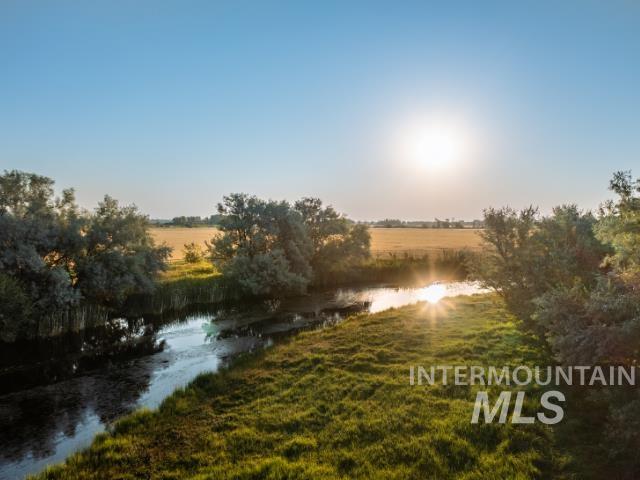 Water view with rural landscape