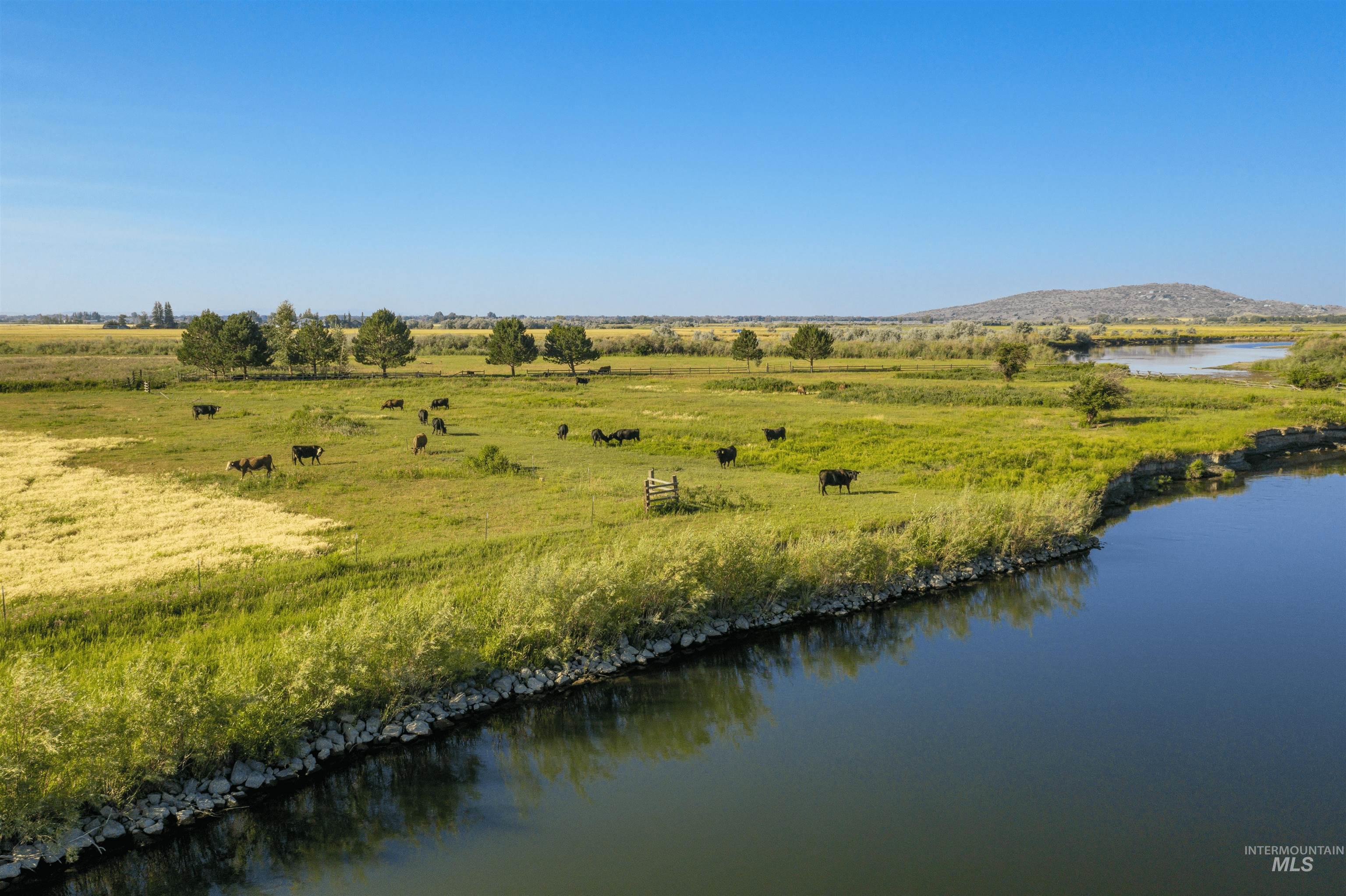 Water view featuring rural landscape and agricultural land