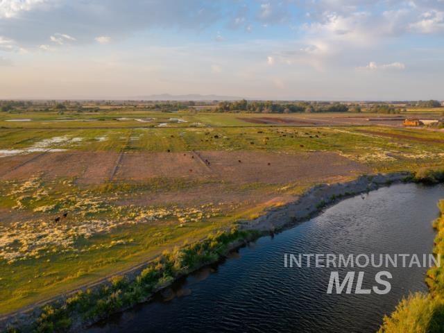 Aerial overview of property's location with rural landscape and a large body of water